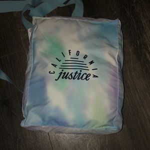 Backpack that turns into a rain jacket. Great for a rainy day.